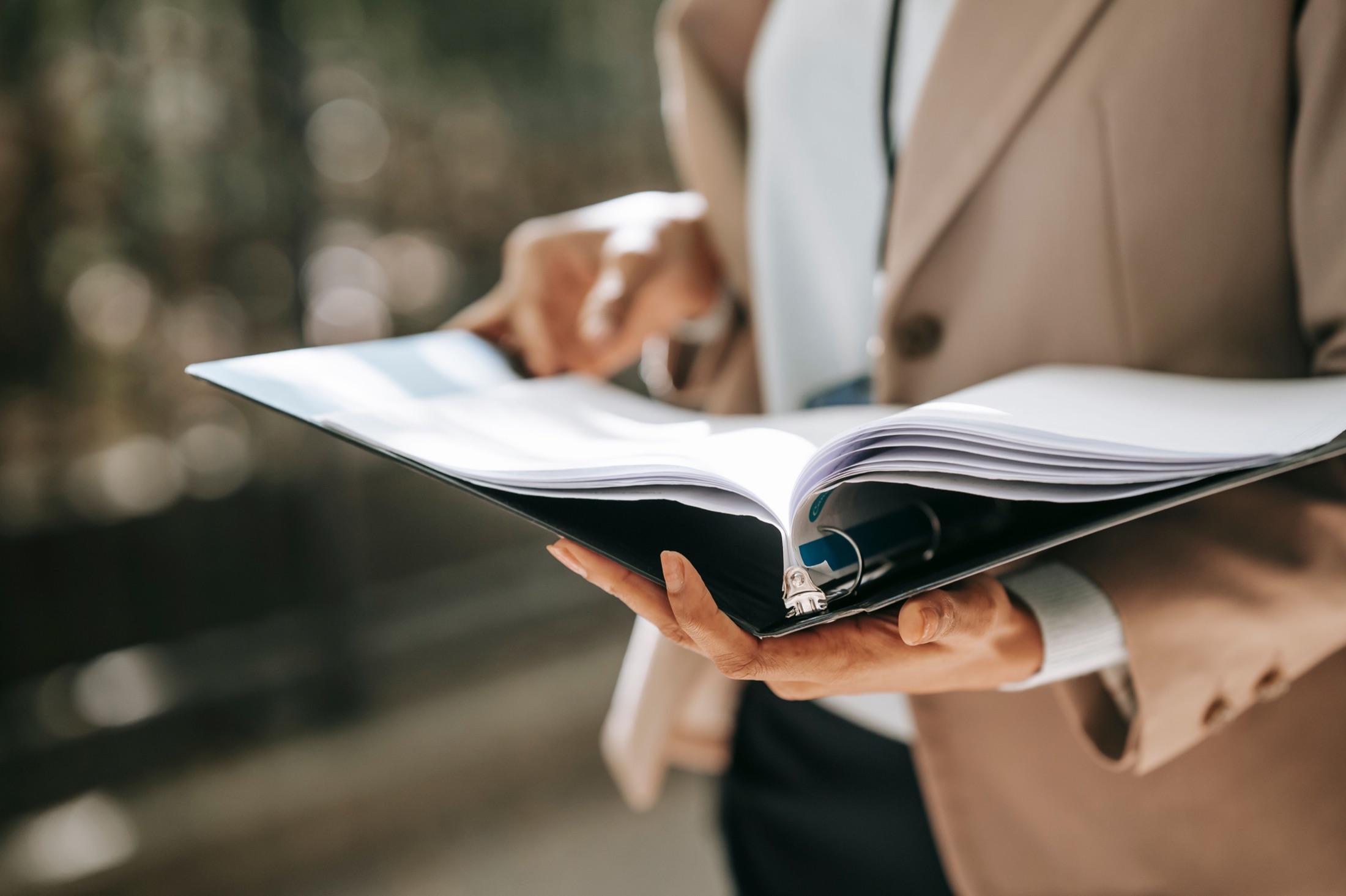 Coordinator reviewing a client file